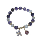 Amethyst crystal bracelet for emotional balance, featuring a delicate butterfly charm and beaded design