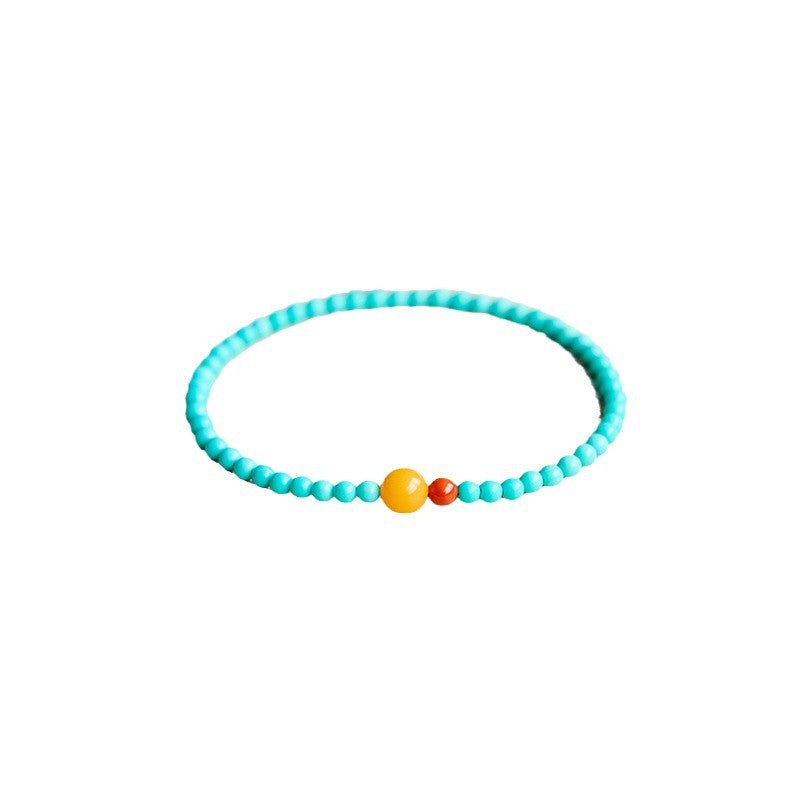 Green turquoise beaded bracelet for luck attraction, featuring 4mm beads and a symbolic charm for positive energy flow.
