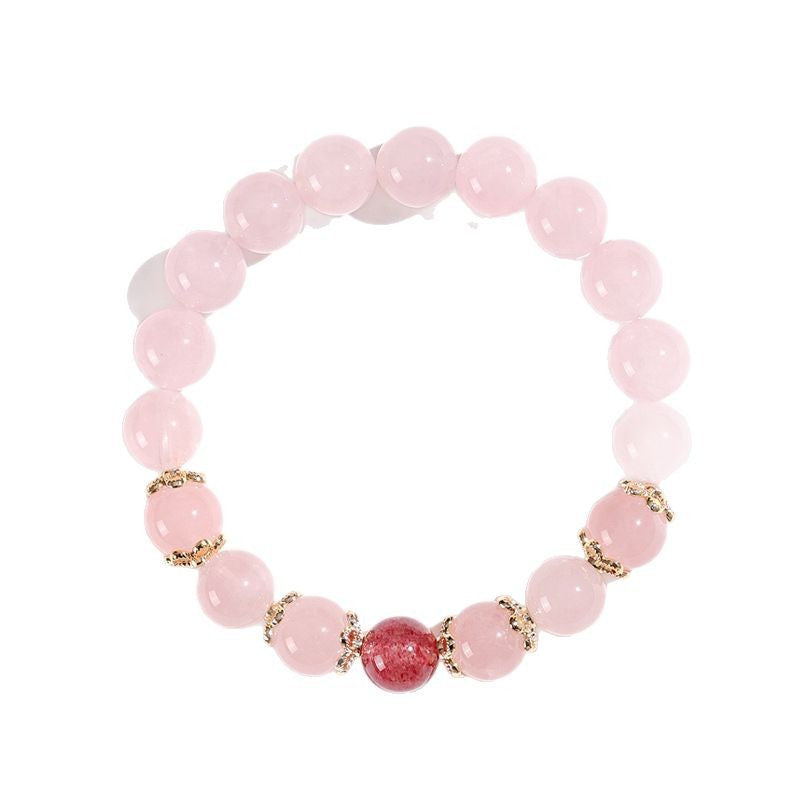 Natural pink quartz crystal beaded bracelet for love attraction, featuring rose quartz and clear quartz beads for energy flow