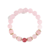 Natural pink quartz crystal beaded bracelet for love attraction, featuring rose quartz and clear quartz beads for energy flow