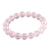 Pink quartz crystal beaded bracelet for love attraction, featuring rose quartz beads for emotional connection and romance.