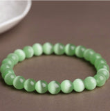 Green Cat's Eye Crystal beaded bracelet for men, a gemstone accessory for luck attraction and positive energy flow