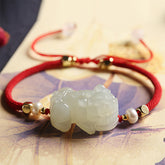 Hetan Jade Pixiu bracelet with black obsidian beads for wealth attraction and energy flow