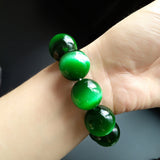 Green Cat's Eye stone bracelet for luck manifestation, featuring natural crystal beads