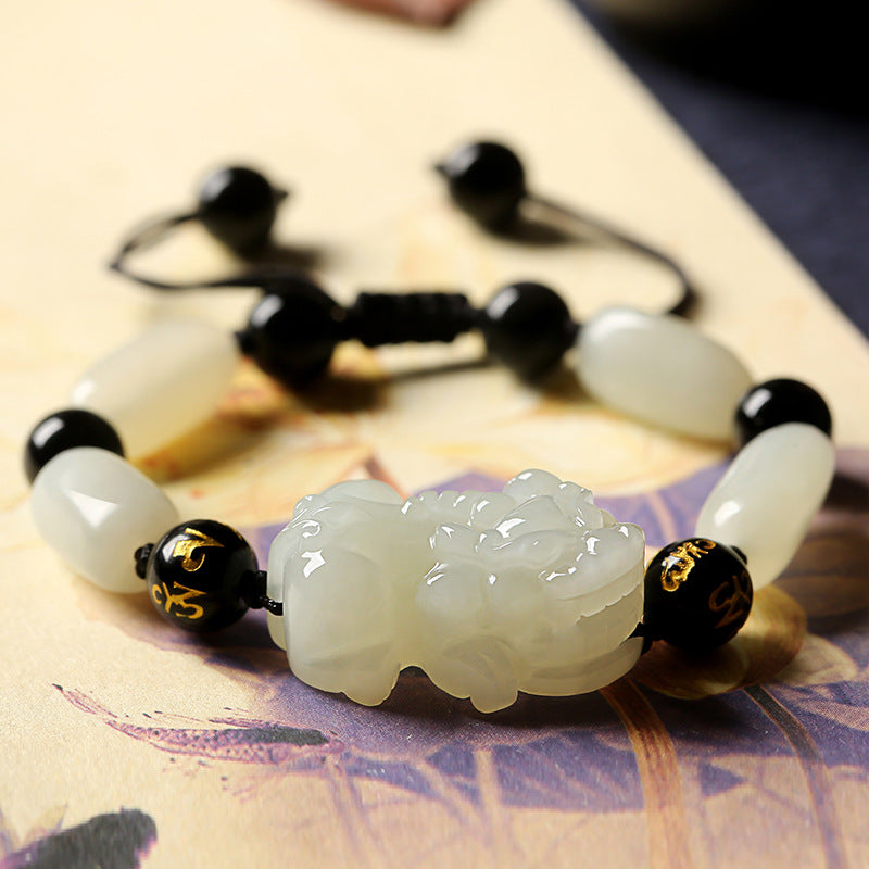 Green jade Pixiu bracelet for wealth attraction, featuring a carved Pixiu charm and gold plated accents for men and women.