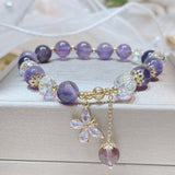 Crystal bracelet with amethyst beads and silver-plated butterfly charm for emotional energy