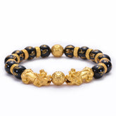 Gold plated Pixiu wealth bracelet with black agate beads for men, attracting prosperity and money flow.