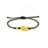 Black string bracelet with gold plated Pixiu charm for wealth attraction and money energy flow