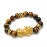 Tiger's Eye beaded bracelet with Pixiu charm for wealth attraction, gold plated accents for prosperity energy