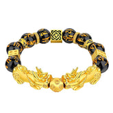 Black obsidian beaded bracelet with two gold plated Pixiu charms for wealth attraction and energy protection