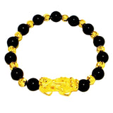 Black Agate Pixiu bracelet for wealth attraction, featuring a gold plated Pixiu charm and beaded design for men and women.