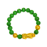 Feng Shui Wealth Tree with gold coins and crystals for prosperity