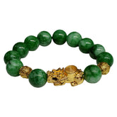 Green jade beaded bracelet with Pixiu charm and gold plated accents for wealth attraction and energy flow
