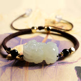 Men's beaded bracelet with Hetian Jade Pixiu charm and Black Obsidian stones for wealth manifestation