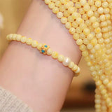 Natural turquoise gemstone bracelet, a beaded design for women focused on luck and enhancing personal energy magnetism.