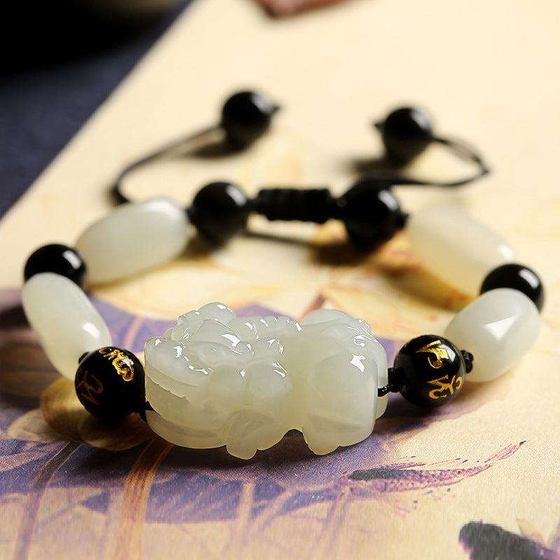 Lucky bamboo money plant with red ribbons for financial abundance