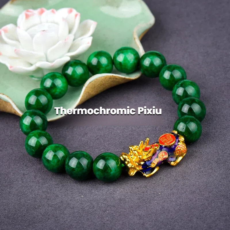 Green Jade Stone bracelet for wealth flow, with a gold-plated Pixiu charm and beaded stone construction.