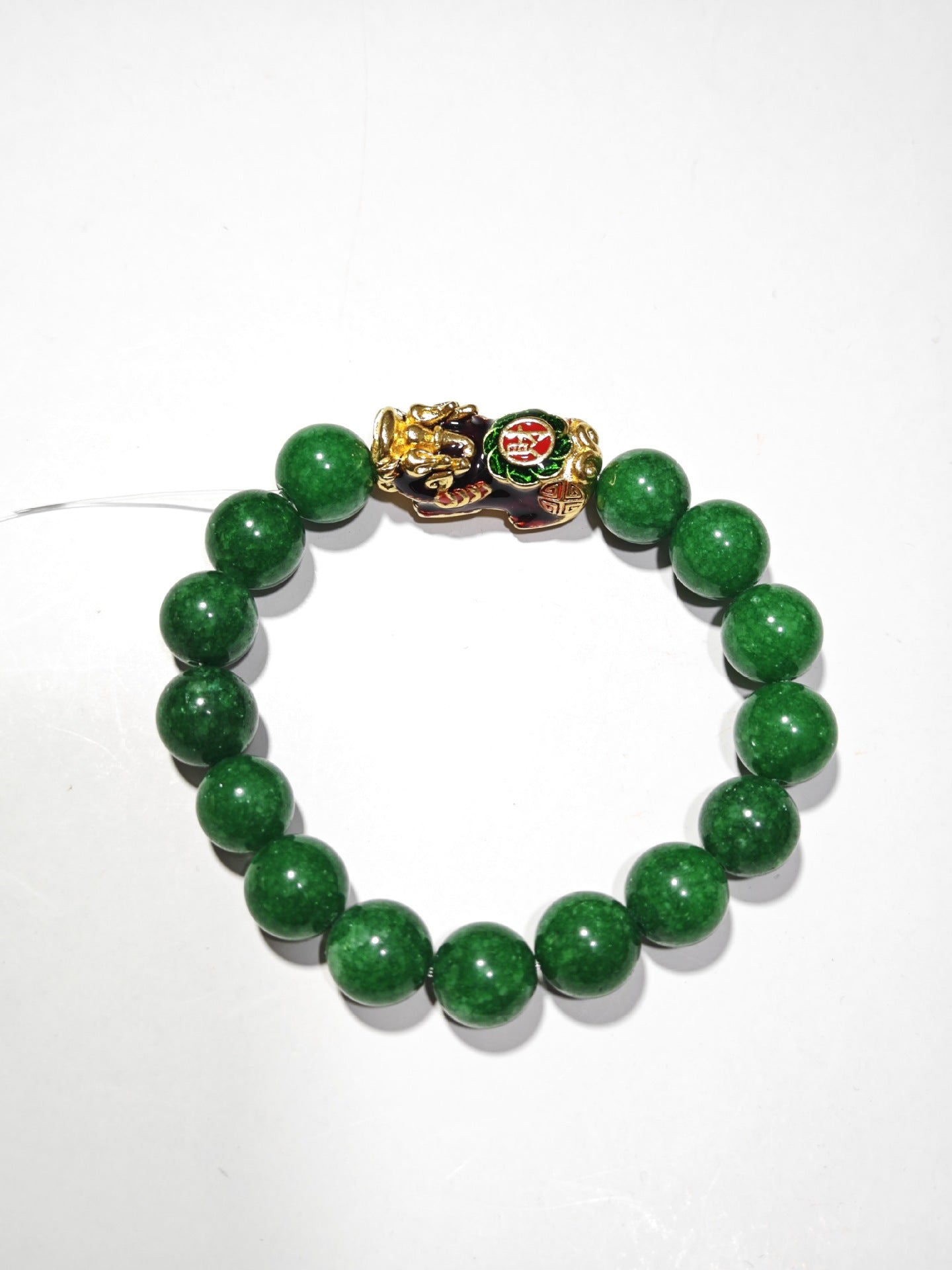 Green Jade Stone and Dark Jade bracelet for wealth attraction, featuring a gold-plated Pixiu charm.
