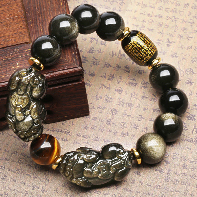 Unisex beaded bracelet made of Black Obsidian with a Pixiu charm, focused on wealth attraction and positive energy.