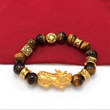 Men's Tiger's Eye bead bracelet with dual Pixiu charms for attracting wealth and financial opportunities