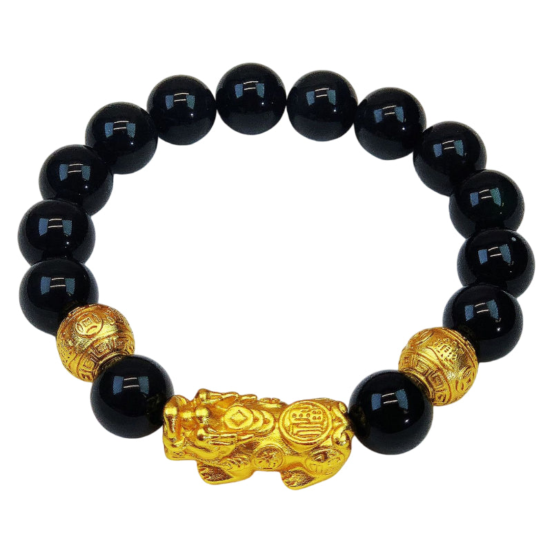 Black obsidian stone bracelet with a gold plated Pixiu, a symbolic accessory for wealth flow and energy.