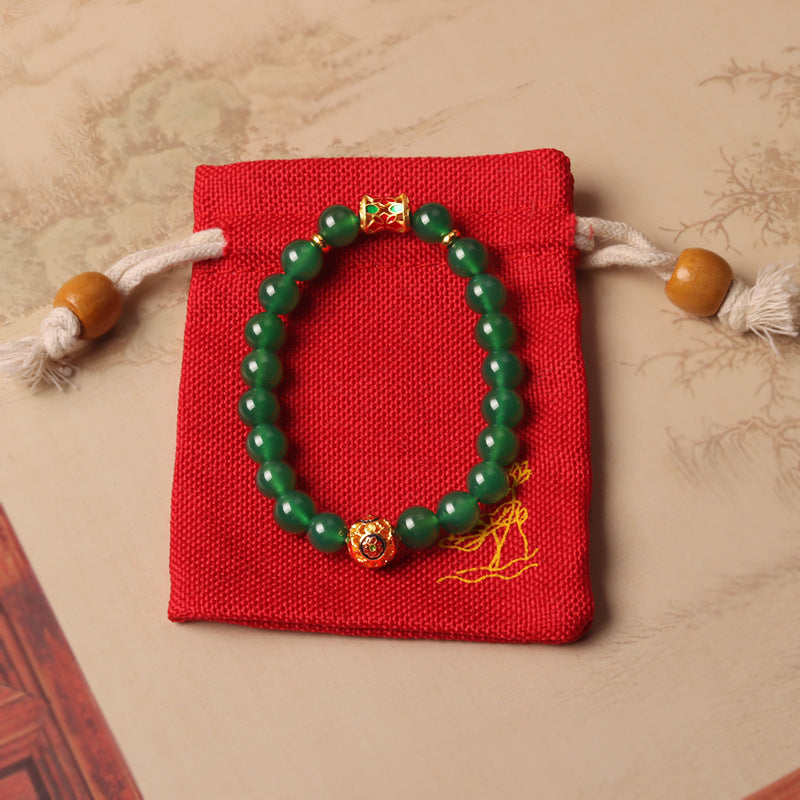 Women's bracelet with green agate beads, a crystal piece for attracting wealth and enhancing prosperity.