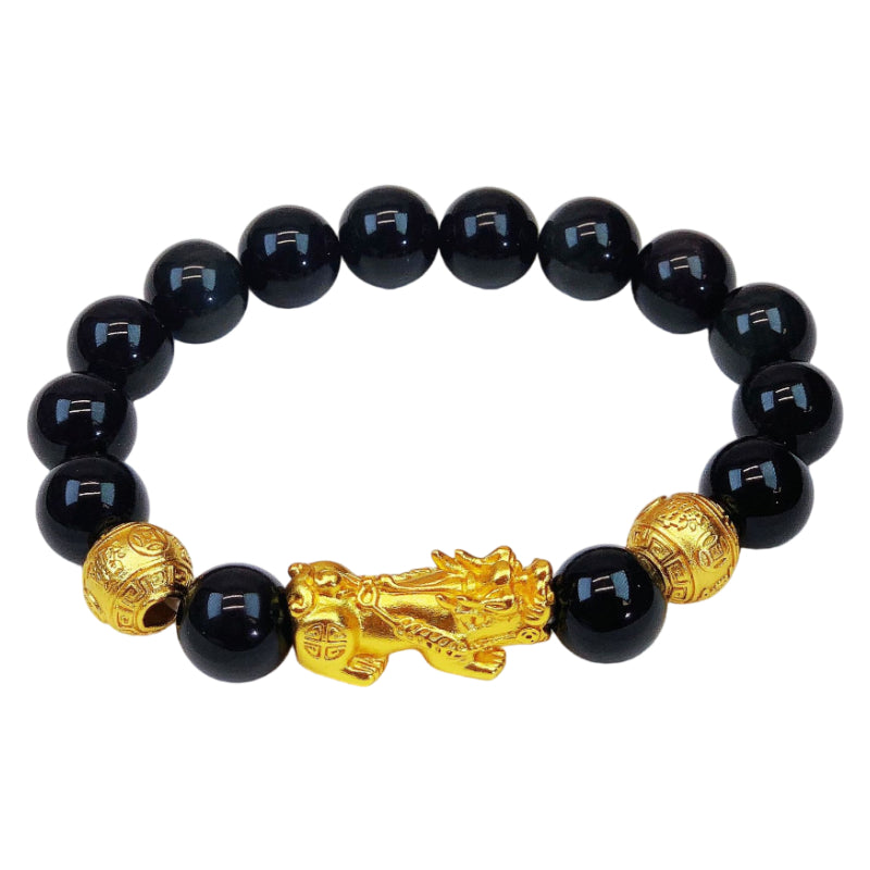 Mens bead bracelet featuring natural black obsidian and a prominent gold plated Pixiu charm for wealth.