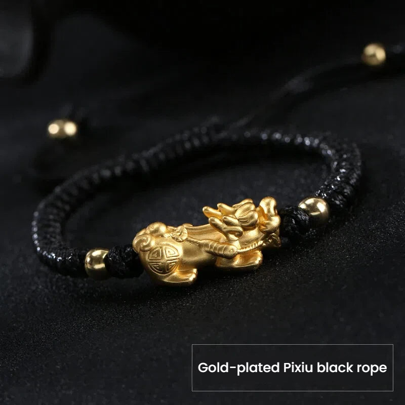 Silver Pixiu wealth bracelet with gold plated charm and black string for men, a feng shui accessory for attracting wealth and prosperity