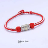 Silver mantra charm on red string bracelet for luck attraction and energy magnetism