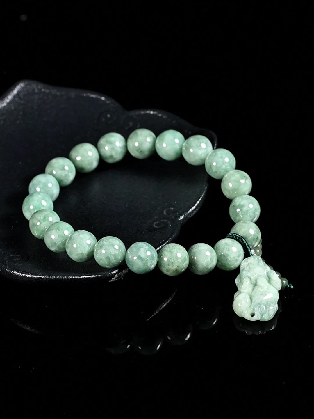 Jade bracelet with Pixiu charm for wealth, a green stone beaded accessory designed for women