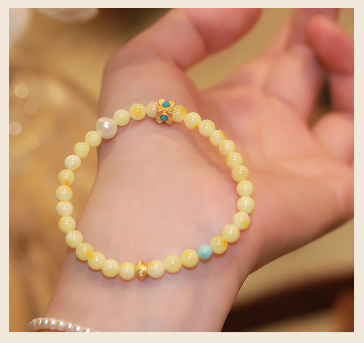Turquoise stone bracelet for luck manifestation, with delicate beads and a lightweight, elegant style.