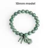 Women's jadeite beaded bracelet featuring a detailed Pixiu, a traditional symbol for wealth attraction and abundance.