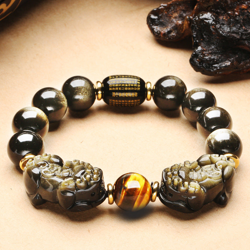 Black Obsidian Pixiu bracelet for wealth attraction, featuring a carved Pixiu charm and beaded design for men and women