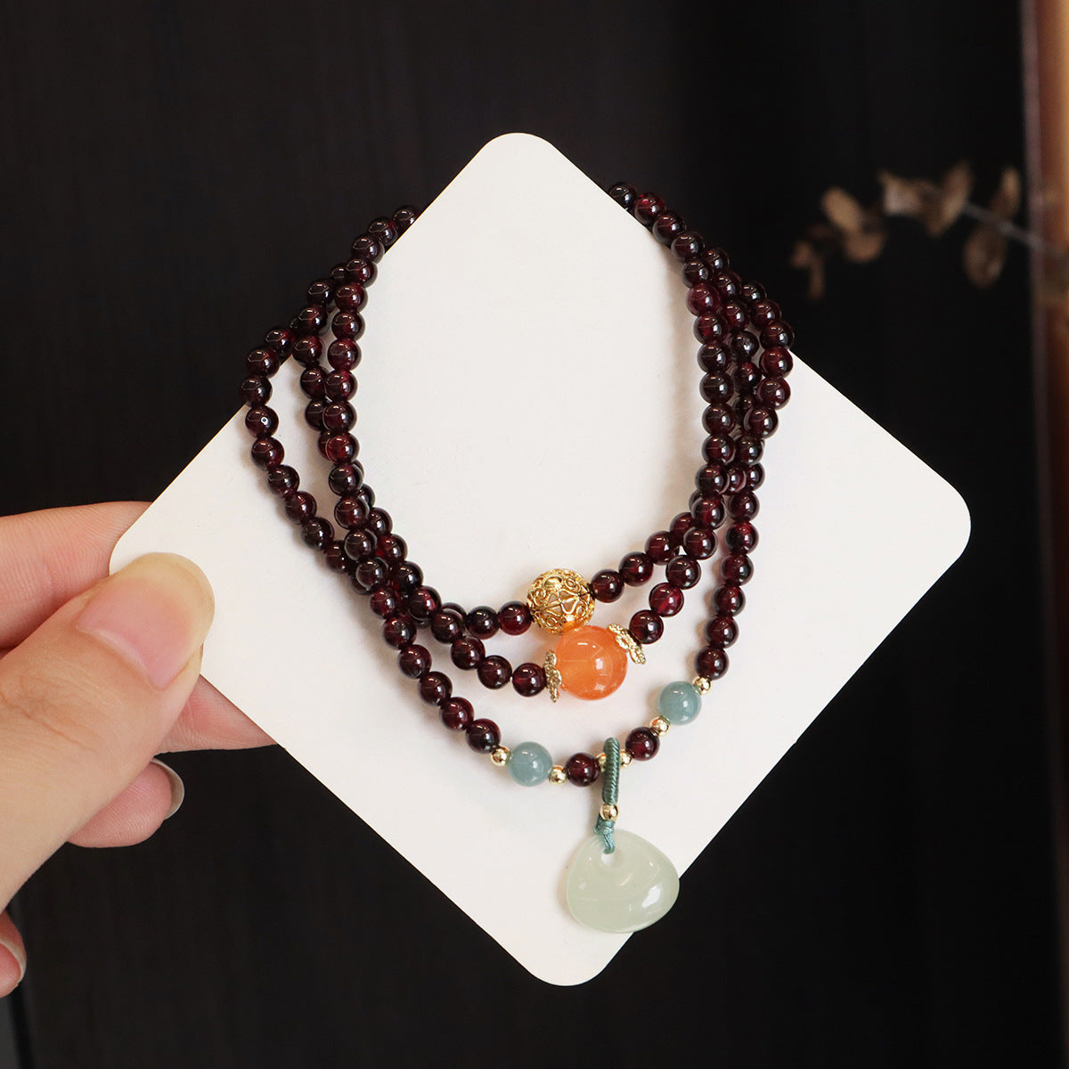 Natural Garnet Stone Bracelet for Attracting Love, Showcasing a Intricate Jadeite Pouch Pendant, Women's Handcrafted Jewelry