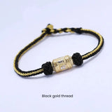 Black string bracelet with silver mantra charm for luck attraction, spiritual energy flow accessory