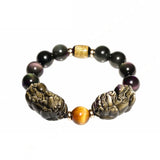 Men's beaded bracelet with Black Obsidian and Pixiu charm, designed for wealth manifestation and energy flow.