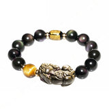 Gold plated Black Obsidian Pixiu bracelet, a beaded crystal accessory for wealth energy and symbolic meaning.
