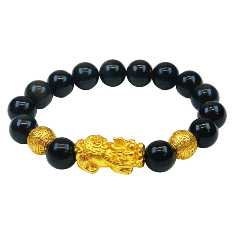 Obsidian beaded bracelet with a gold-plated Pixiu charm, a symbol for attracting wealth and prosperity.